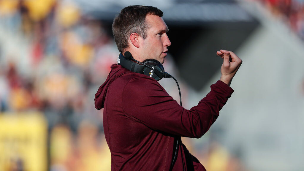 Arizona State Sun Devils head coach Kenny Dillingham gestures to a player during the college footba...