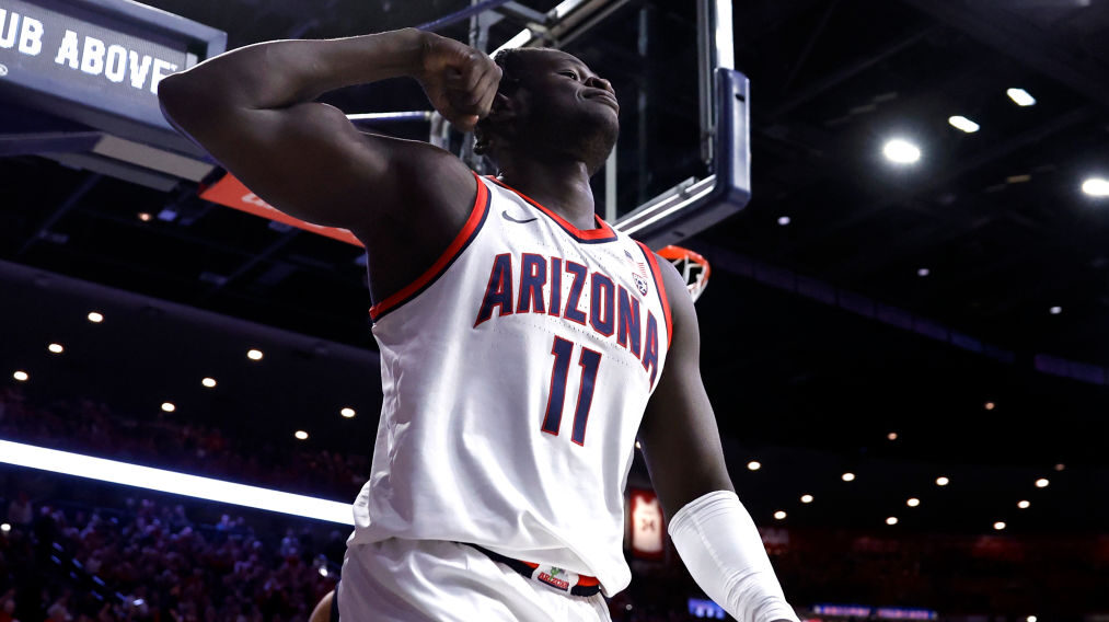 Oumar Ballo of the Arizona Wildcats reacts after being fouled...