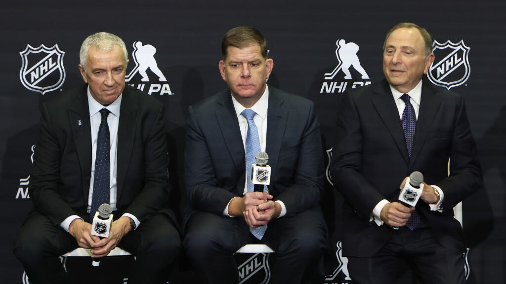 IIHF President Luc Tarif,  NHLPA executive director Marty Walsh and NHL commissioner Gary Bettman s...