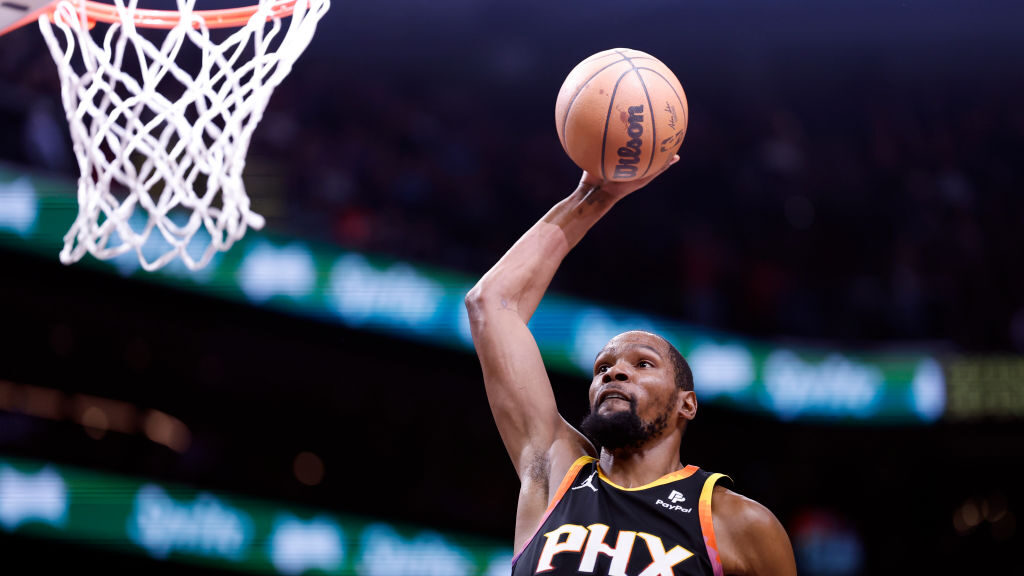 Kevin Durant #35 of the Phoenix Suns dunks during the first half against the Utah Jazz at Footprint...