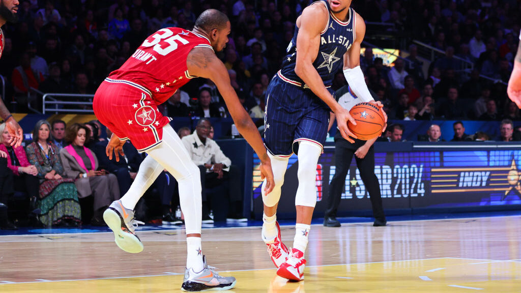 Giannis Antetokounmpo #34 of the Milwaukee Bucks and Eastern Conference All-Stars dribbles the ball...
