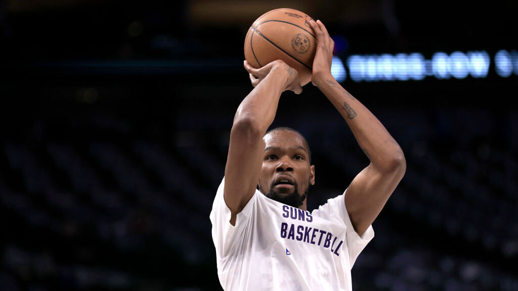 Kevin Durant of the Phoenix Suns warms up before the game against the Dallas Mavericks at American ...