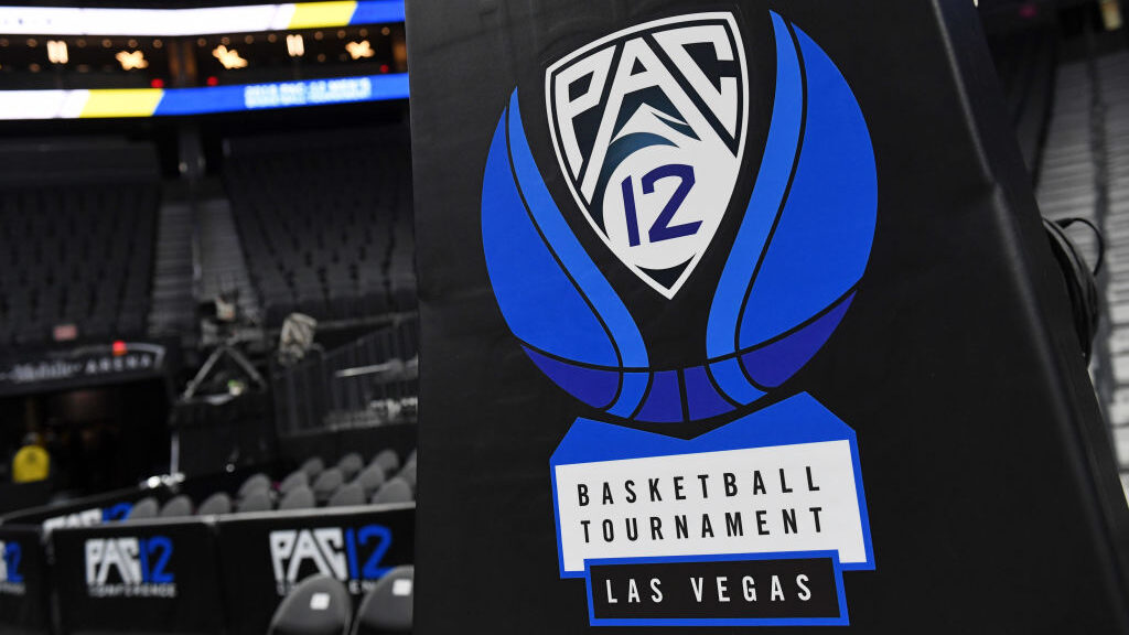 A Pac-12 basketball logo is shown on a stanchion before a semifinal game of the of the Pac-12 baske...