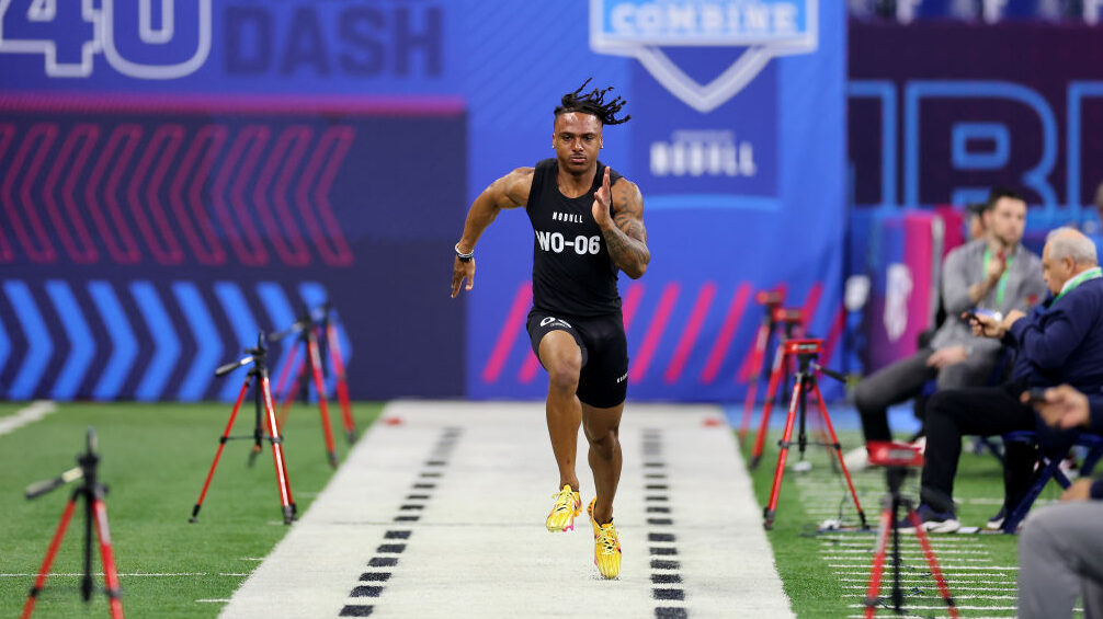 Jacob Cowing runs the 40-yard dash at the NFL Draft Combine...
