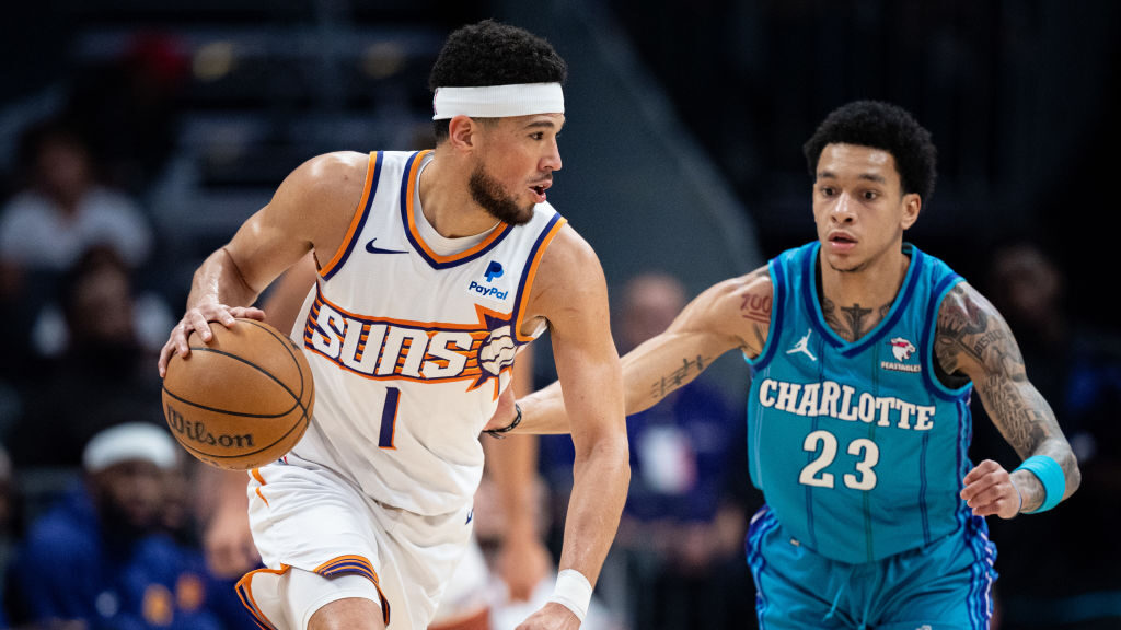 Devin Booker takes new leap as Suns point guard in dual role