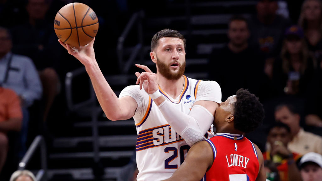 Jusuf Nurkic #20 of the Phoenix Suns passes over Kyle Lowry #7 of the Philadelphia 76ers during the...