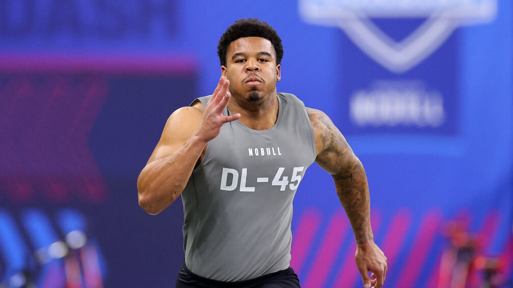 Chop Robinson runs the 4-=yard dash at the NFL Draft Combine