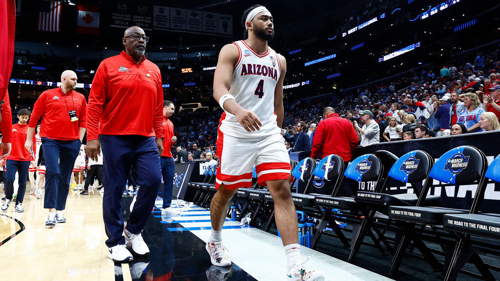 Kylan Boswell #4 of the Arizona Wildcats reacts as he walks off the court after losing to the Clems...