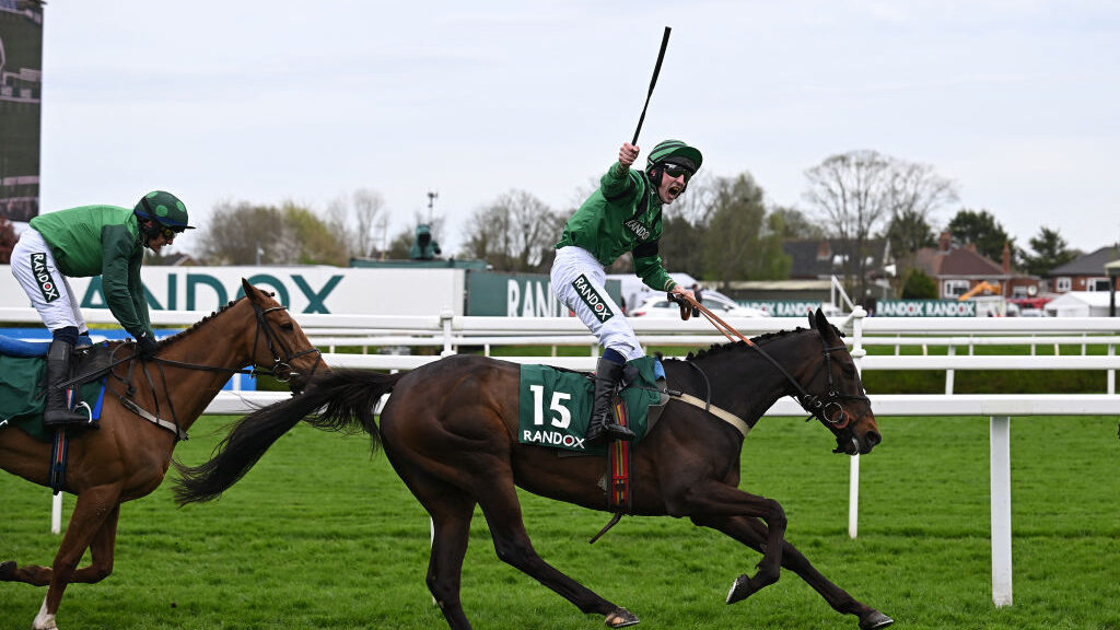 Arizona Cardinal wins the Topham Handicap Chase race on the second day of the Grand National Festiv...