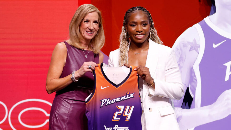 Charisma Osborne poses with a Mercury jersey during the WNBA Draft...