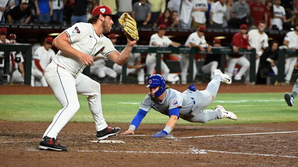 Diamondbacks' victory squirts away to the backstop, Cubs swipe win in extras