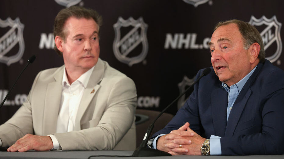 Gary Bettman and Alex Mereulo speaking with Media in a press conference....