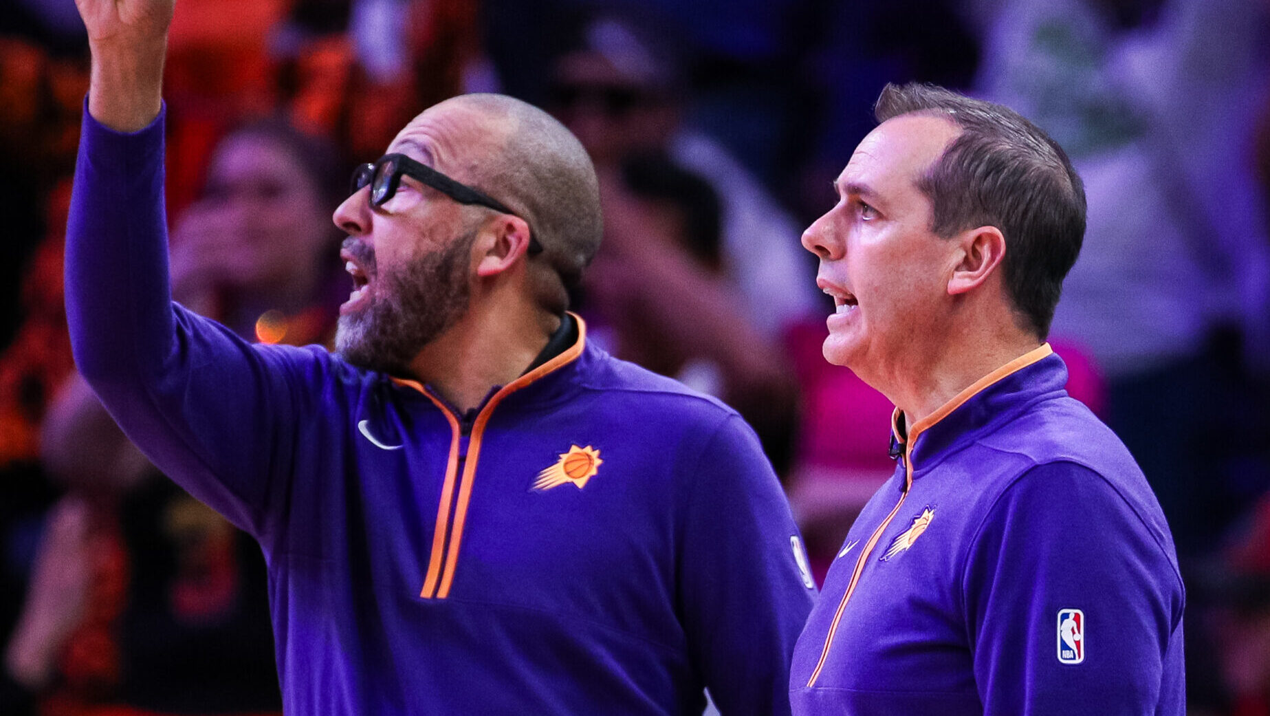 Suns assistant coach David Fizdale next to head coach Frank Vogel...
