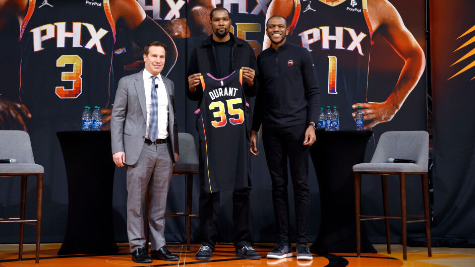 Owner Mat Ishbia, Kevin Durant and general manager James Jones of the Phoenix Suns pose for a photo...