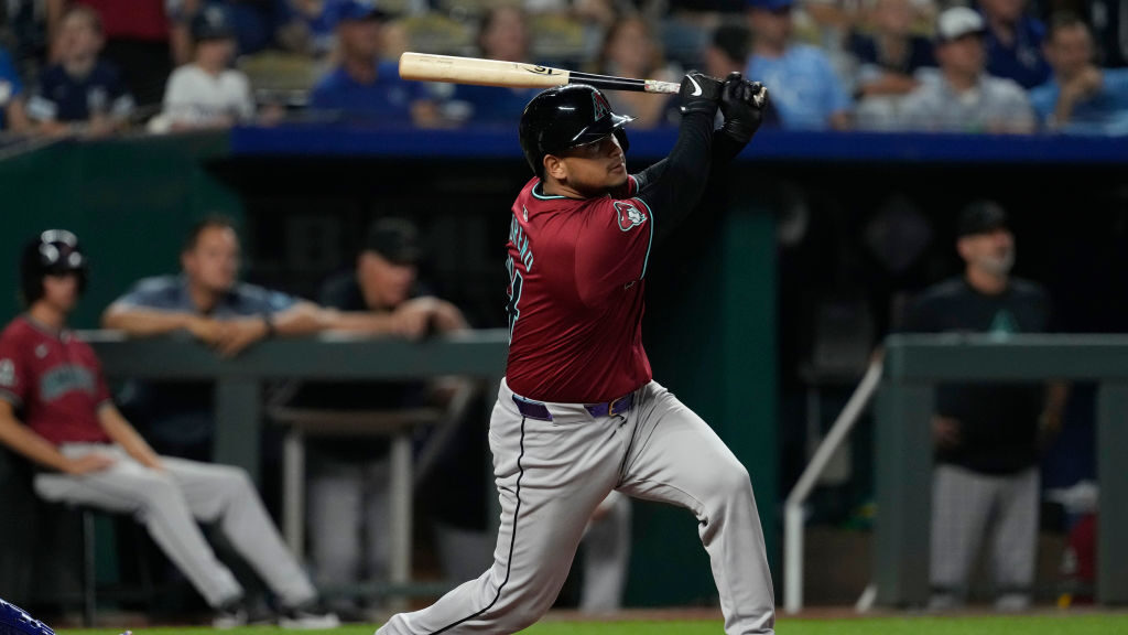 Gabriel Moreno #14 of the Arizona Diamondbacks hits a two-run double in the ninth inning against th...