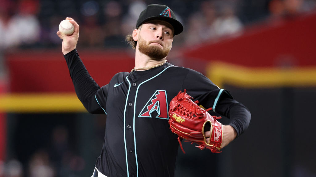 Starter Ryne Nelson #19 of the Arizona Diamondbacks pitches against the New York Mets during the fi...