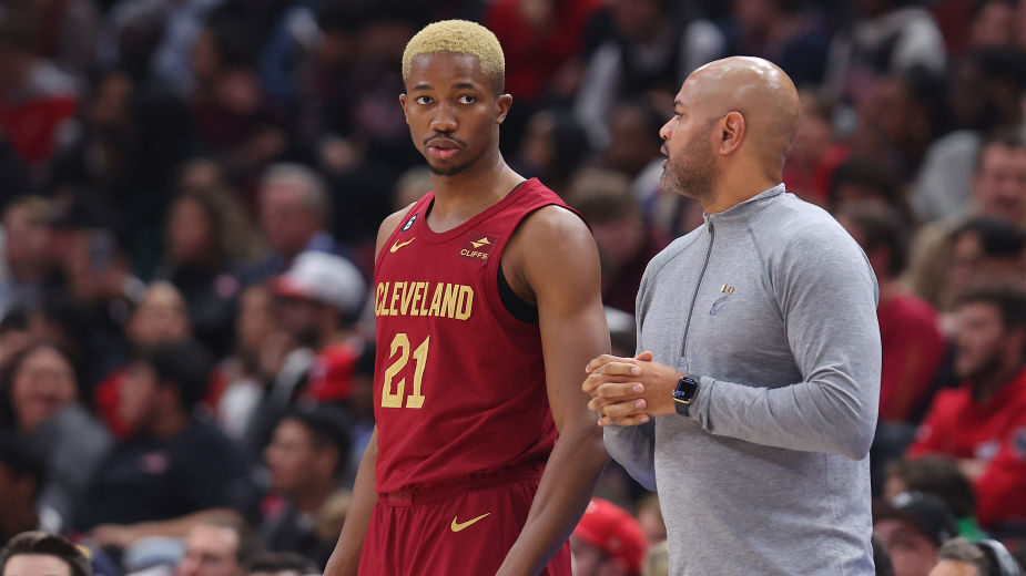 Head coach J. B. Bickerstaff of the Cleveland Cavaliers talks with Mamadi Diakite...