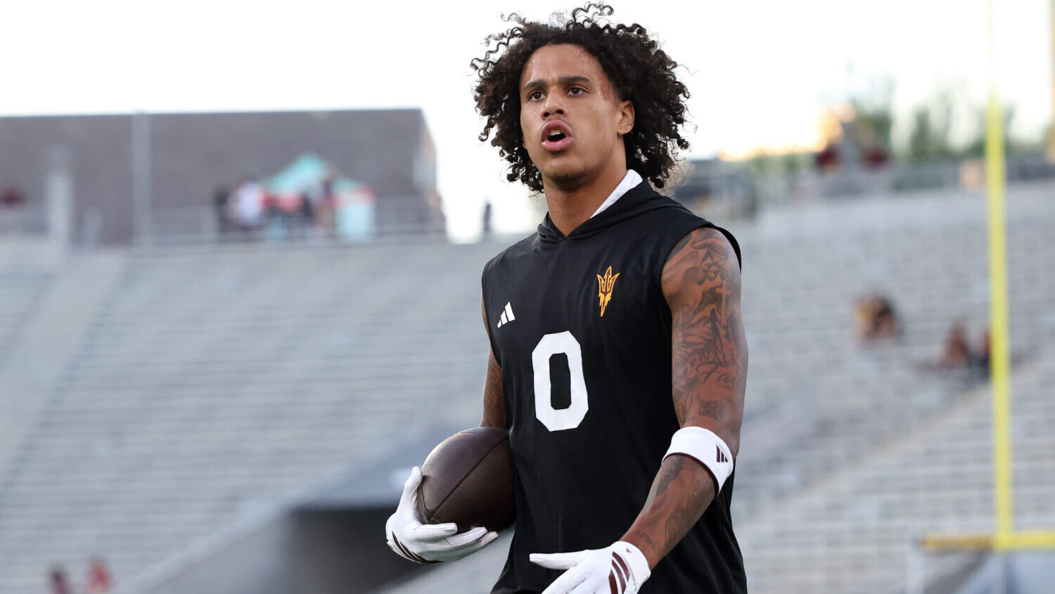 Wide receiver Jordyn Tyson #0 of the Arizona State Sun Devils warms up before the game against the ...
