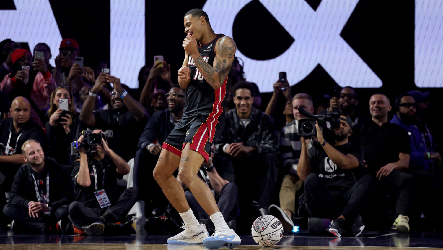 INGLEWOOD, CALIFORNIA - FEBRUARY 14: Keshad Johnson #16 of the Miami Heat dances after a dunk durin...