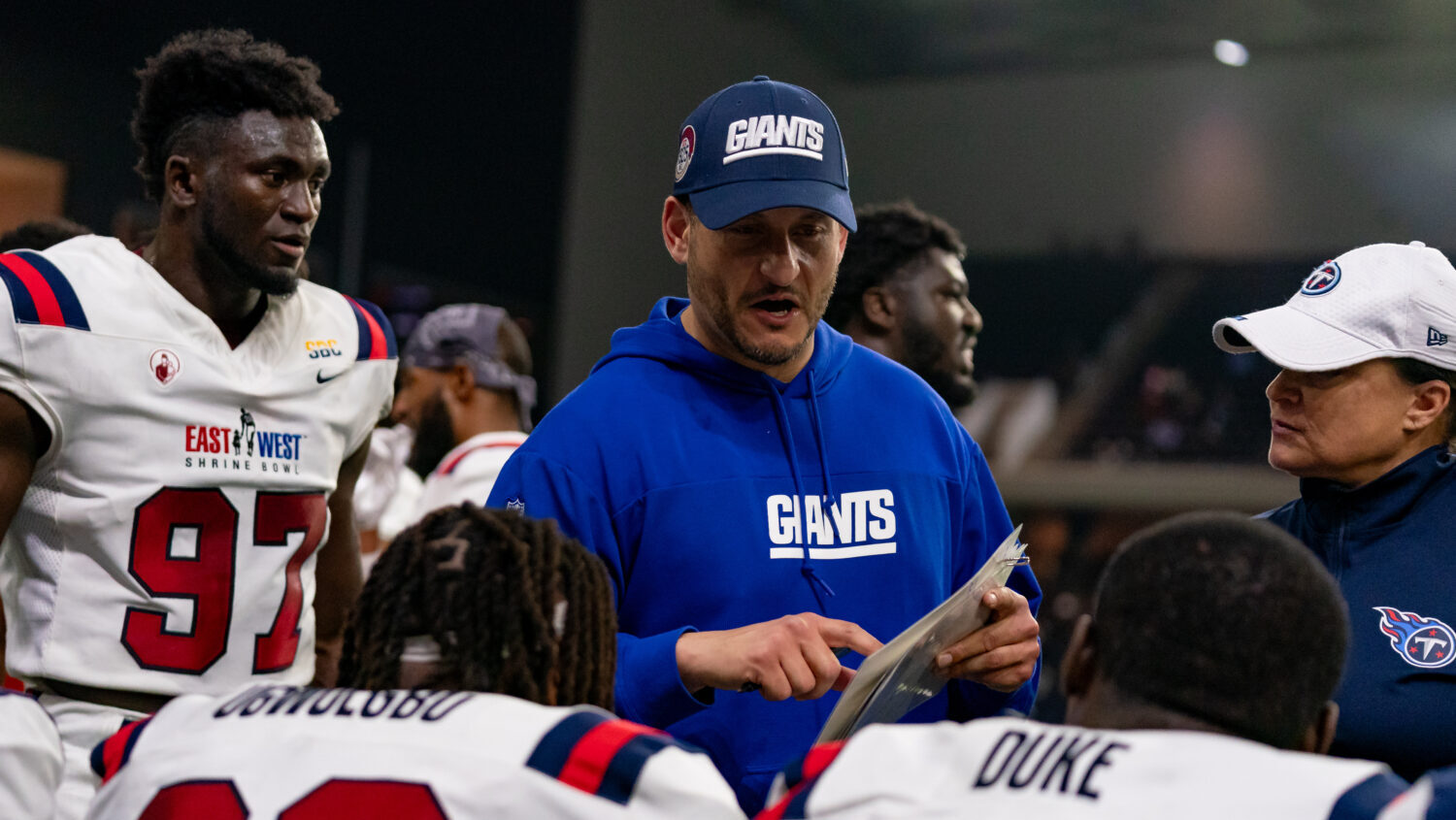 East Team special teams coordinator Michael Ghobrial speaks with his team during the East-West Shri...