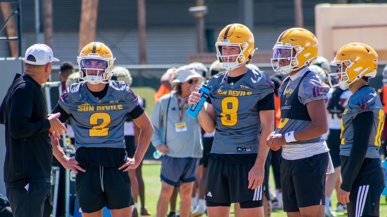 ASU quarterbacks Jake Fette (2), Cutter Boley (8), Cam Dyer (13) and Mikey Keene (12) with offensiv...