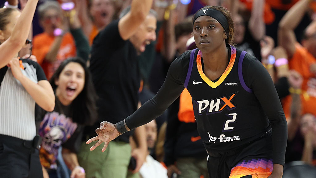 Kahleah Copper #2 of the Phoenix Mercury celebrates after a made three point basket against the Las...