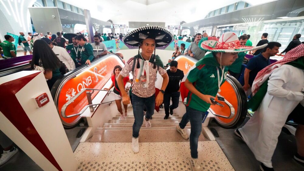 Mexico soccer fans exit the metro station on their way to a World Cup group C soccer match between ...