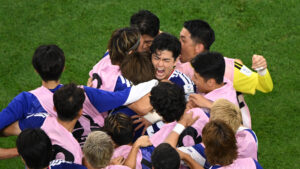 Daichi Kamada's late header gives Japan a 2-2 draw with the Netherlands in World Cup opener