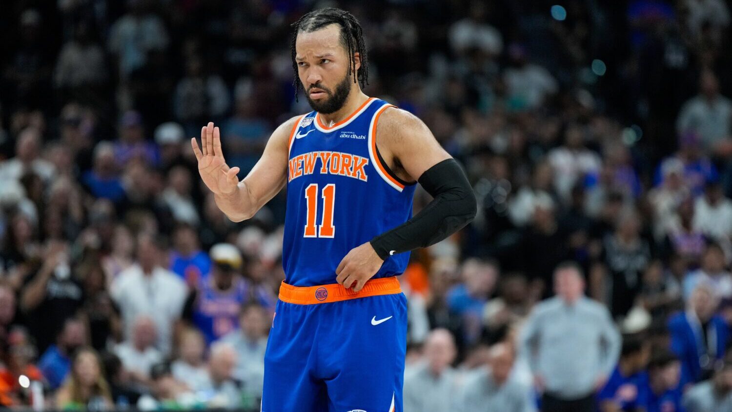 New York Knicks guard Jalen Brunson motions to teammates during the second half of Game 5 of the NB...
