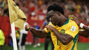 Australia downs Turkey, joins US as Group D teams to win their World Cup opener