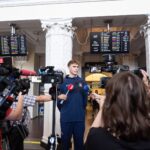 Lithuanian native and Arizona center Motiejus Krivas faces the media in Lithuania. (Arizona Athletics)