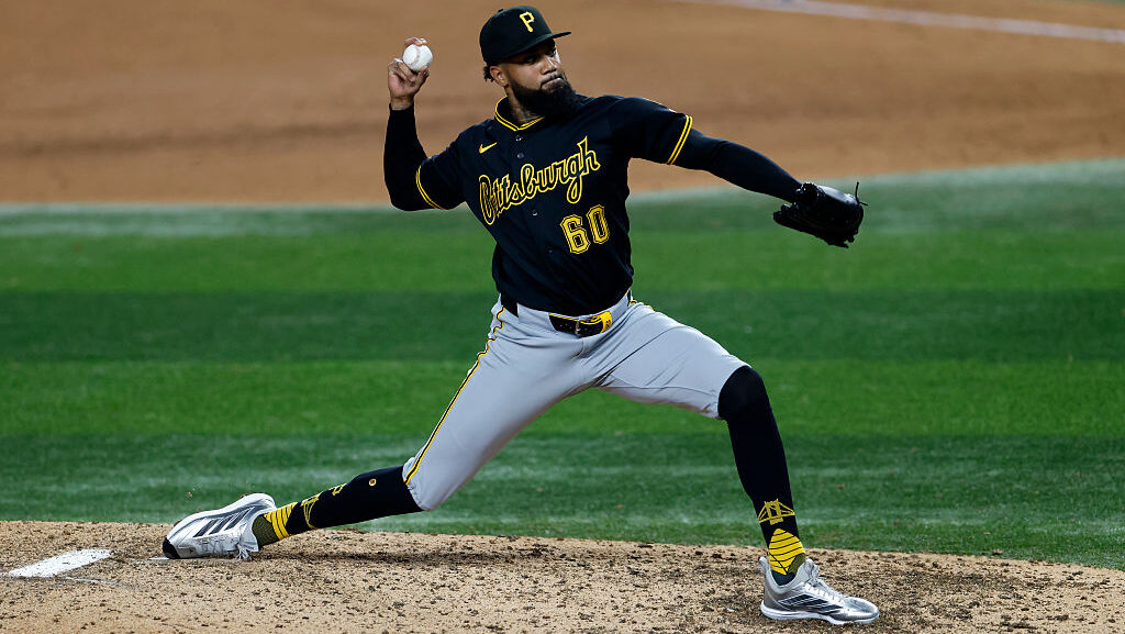 ARLINGTON, TEXAS - APRIL 22: Dennis Santana #60 of the Pittsburgh Pirates pitches against the Texas...