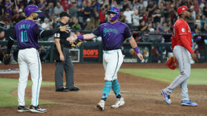 Diamondbacks band together for series win over Reds to keep pace in unrelenting Wild Card race