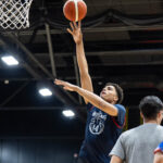 Incoming freshman Endurance Aiyamenkhue finishes near the rim at practice in Vilnius. (Arizona Athletics)