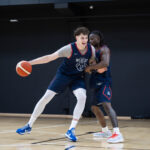 Lithuanian native and Arizona forward Ugnius Jarusevicius being defended by Caleb Holt in Vilnius. (Arizona Athletics)