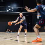 Arizona forward Ivan Kharchenkov passes the ball to Endurance Aiyamenkhue in Vilnius. (Arizona Athletics)
