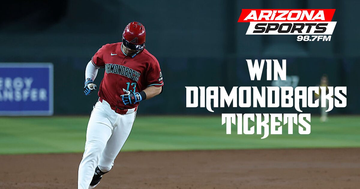 Arizona Diamondbacks outfielder Tim Tawa (#13) runs the bases in a red Diamondbacks jersey at Chase...