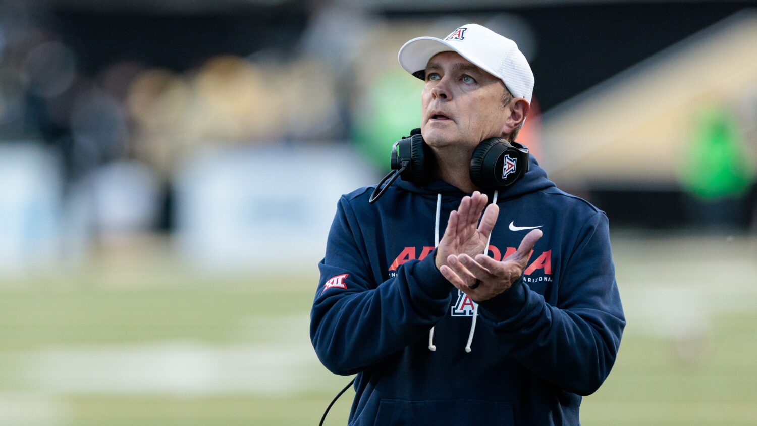 Arizona Wildcats defensive coordinator Danny Gonzales walks the sideline during the second half aga...