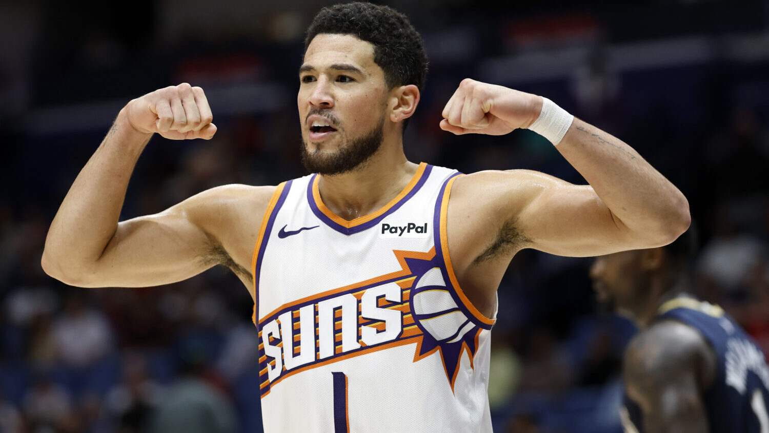 Devin Booker #1 of the Phoenix Suns reacts during the second half of a game against the New Orleans...
