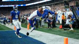 Cam Skattebo lands backflip following first TD since injury