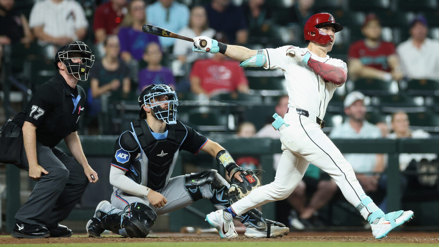 Corbin Carroll #7 of the Arizona Diamondbacks hits a walk off home run against the Miami Marlins du...