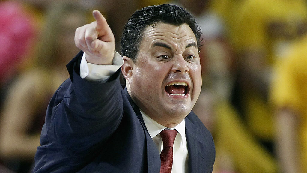 TEMPE, AZ - FEBRUARY 14:  Head coach Sean Miller of the Arizona Wildcats directs his players from t...