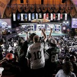 Jets fans cheer during the NFL Draft Saturday at Radio City Music Hall in New York. The Jets selected cornerback Darrelle Revis from Pittsburgh,when they traded up to the 14th pick overall with the Carolina Panthers from the 25th selection. AP Photo/Stephen Chernin