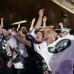 Eric Crumb cheers with other Jets fans after as they cheer during the NFL Draft Saturday at Radio City Music Hall. AP Photo/Stephen Chernin