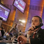 A New York Giants draft representative talks on the phone before making their selection during the first round of the NFL Draft Saturday. The Giants selected cornerback Micharl Griffin, from Texas, with the 20th pick overall in the football draft. AP Photo/Jason DeCrow