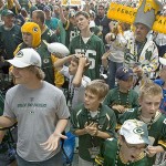 Green Bay Packers fans react to the Packers first-round selection Saturday. The Packers picked Justin Harrel, a defensive tackle from Tennessee, with the 16th overall pick. AP Photo/Mike Roemer
