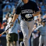All Star Wade Boggs watches his first inning solo home run in the All Star Legends & Celebrity softball game at Yankee Stadium in New York, Sunday.
