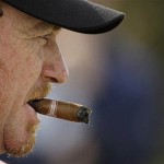 Miguel Angel Jimenez of Spain looks on during practice for the British Open Golf championship, at the Royal Birkdale golf course, Southport, England, Tuesday, July 15, 2008. (AP Photo/Matt Dunham)