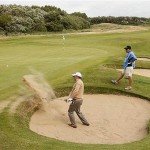 Graeme McDowell of Northern Ireland plays from a bunker near the 5th green during practice for the British Open Golf championship, at the Royal Birkdale golf course, Southport, England, Wednesday, July 16, 2008. (AP Photo/Jon Super)