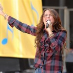Singer Miley Cyrus performs on ABC's "Good Morning America" show in Bryant Park on Friday, July 18, 2008, in New York. (AP Photo/Peter Kramer)